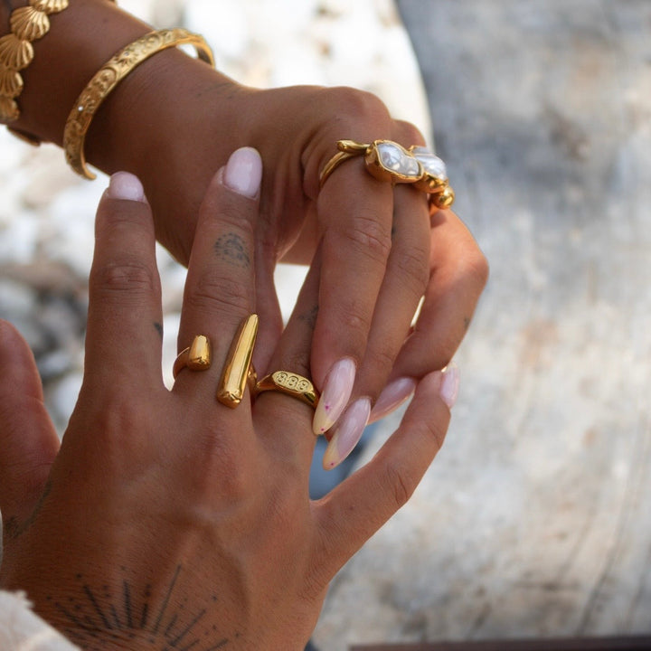Axis – verstelbare sculpturale gouden ring