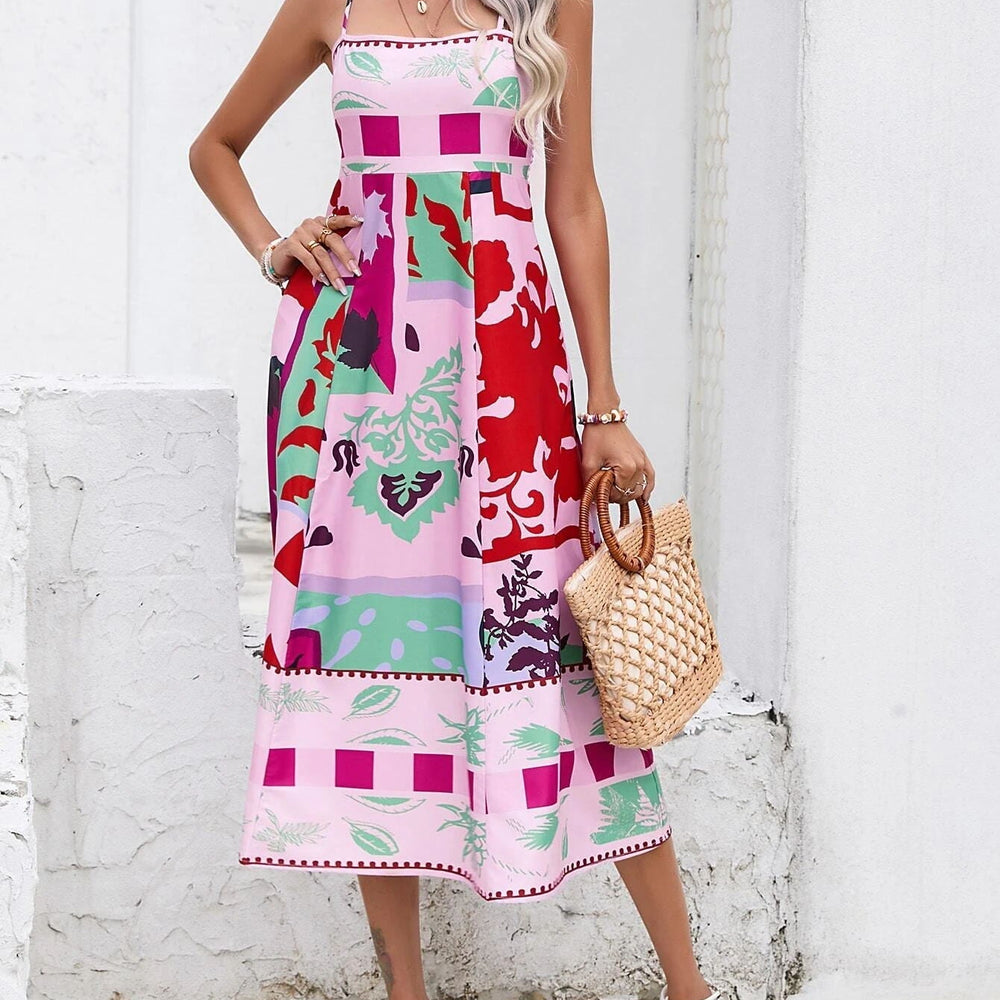 
                  
                    Quiana - Maxi-Jurk met Spaghettibandjes en Artistieke Print - SkinzLine
                  
                