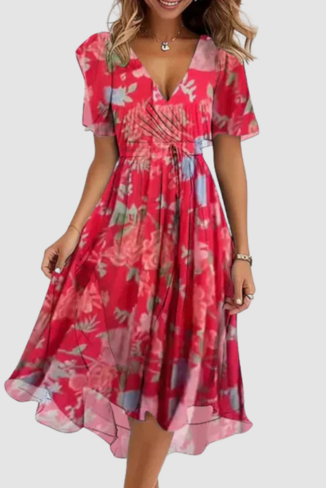 
                  
                    Nadia – Luchtige Chiffonjurk met Bloemenmotief
                  
                