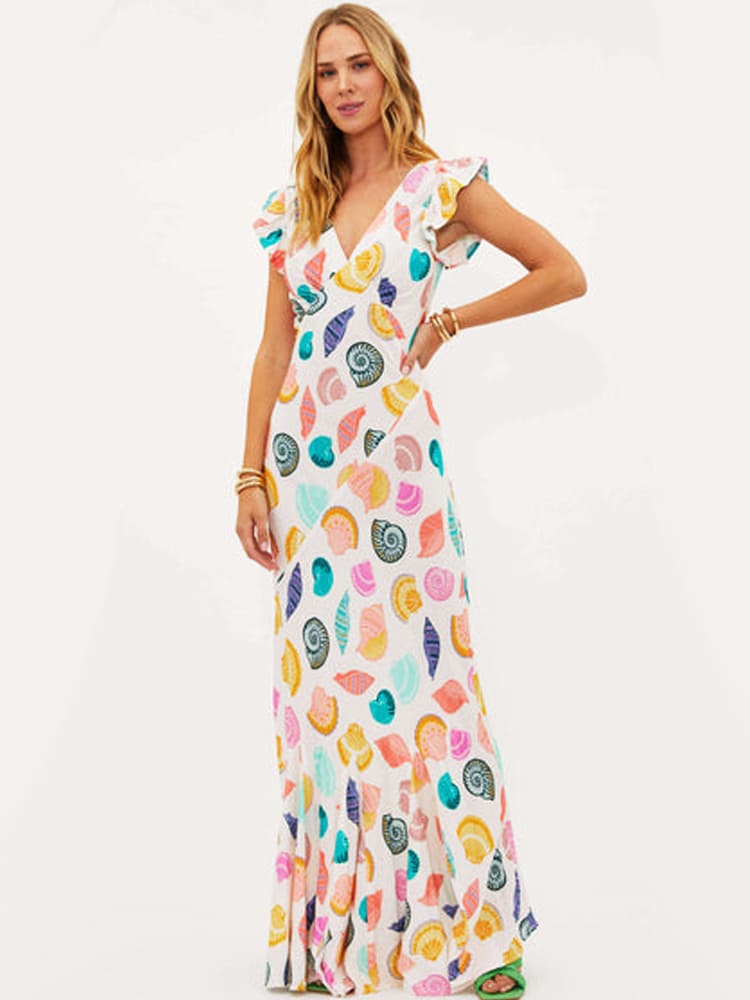 
                  
                    Sabrina - Vrolijke Maxi-Jurk met Diepe V-hals en Schelpenprint - SkinzLine
                  
                