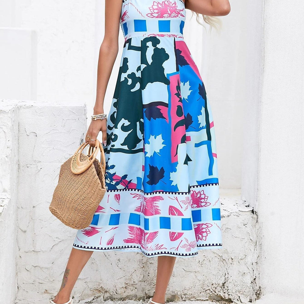 
                  
                    Quiana - Maxi-Jurk met Spaghettibandjes en Artistieke Print - SkinzLine
                  
                