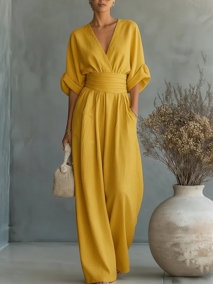 Elegante damesjumpsuit met V-hals en wijd uitlopende pijpen met hoge taille