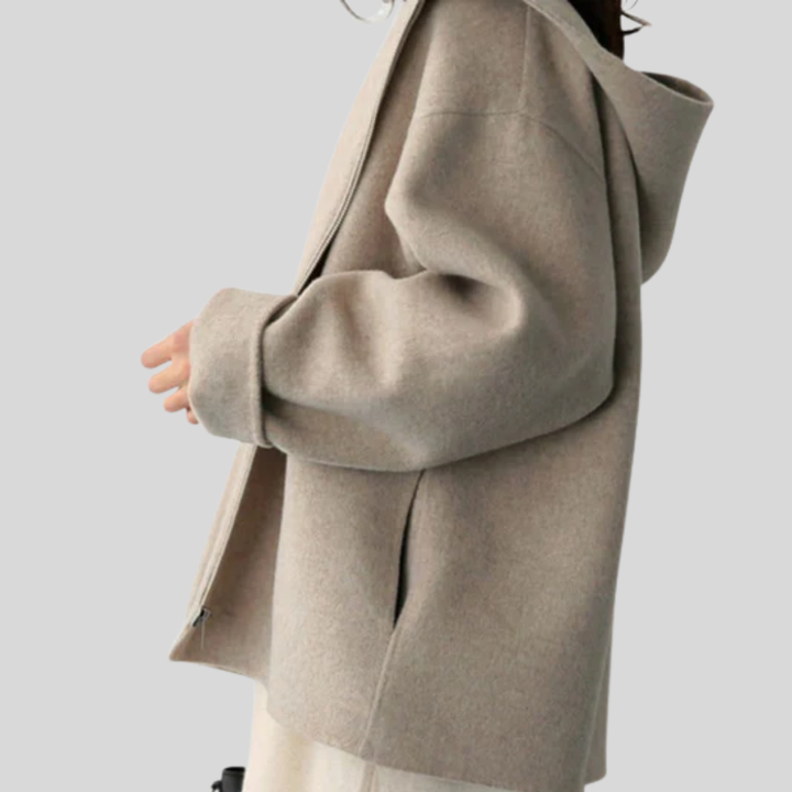 Dames capuchonjack met functioneel design