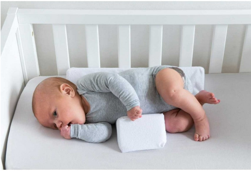 Verstelbaar antirolkussen voor baby's – Cudlo