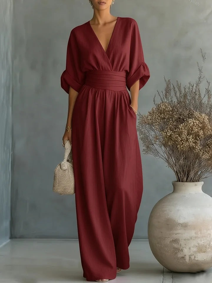 Elegante damesjumpsuit met V-hals en wijd uitlopende pijpen met hoge taille