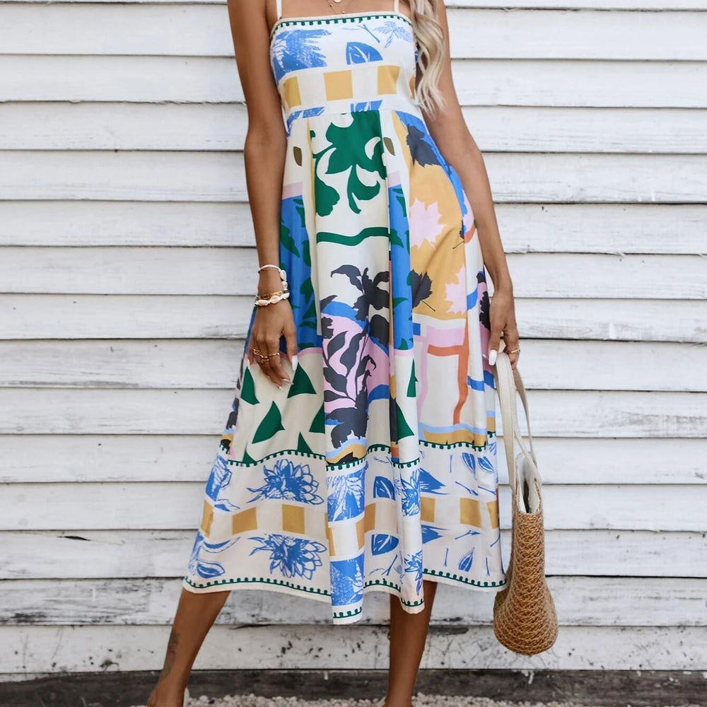 
                  
                    Quiana - Maxi-Jurk met Spaghettibandjes en Artistieke Print - SkinzLine
                  
                