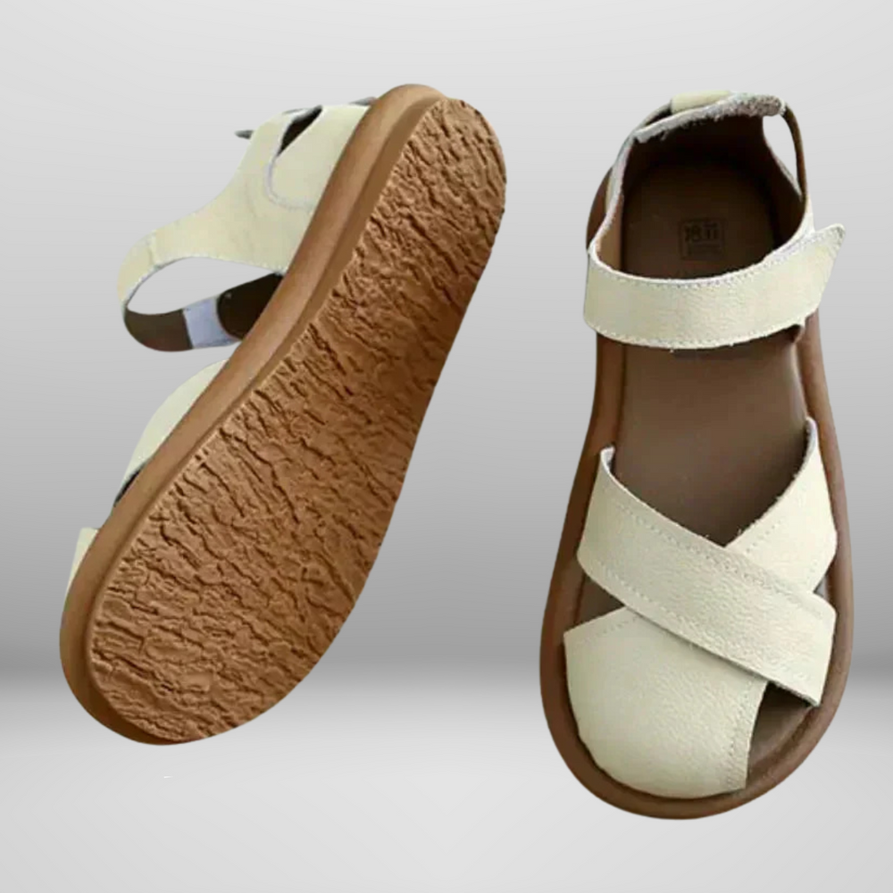 
                  
                    Alvenza – Comfortabele Dichte Sandalen met Kruisdesign
                  
                