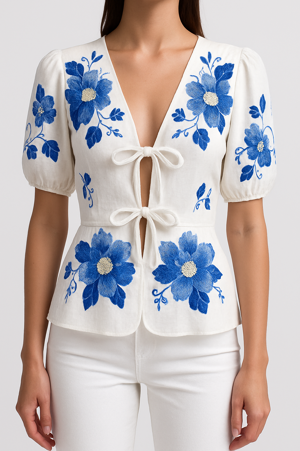 Amara – Gebloemde Blouse met Strikdetail