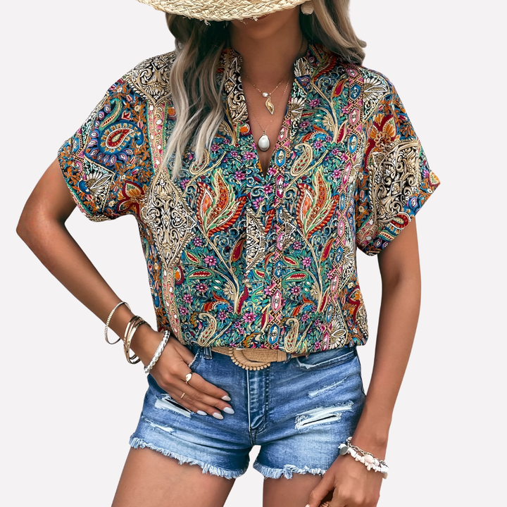 Comfortabele damesblouse met V-hals, paisleyprint en verlaagde schouders