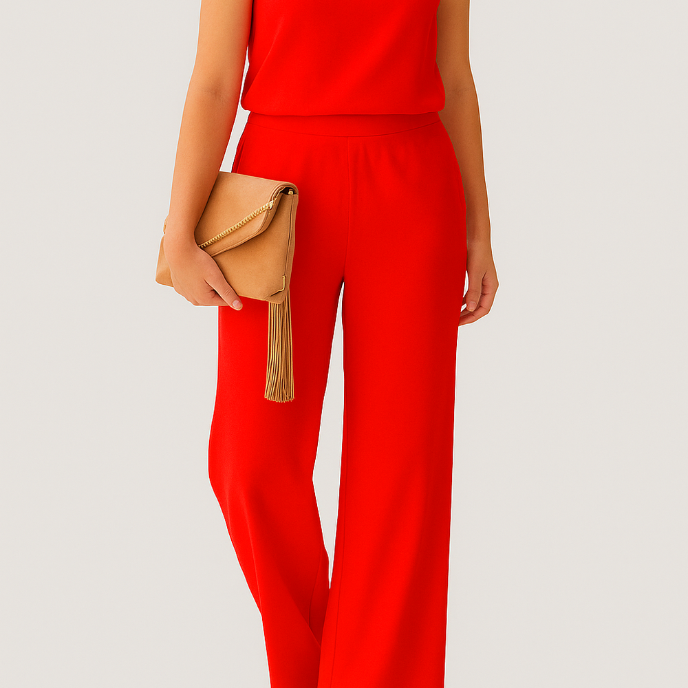 
                  
                    Delvara – Elegante Damesjumpsuit met Ronde Hals en Wijde Pijpen - SkinzLine
                  
                