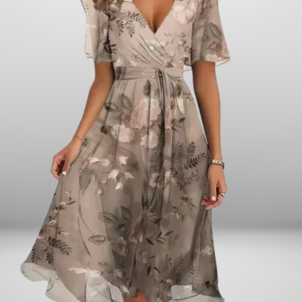 
                  
                    Floranya – Elegante Bloemenjurk met Zwierige Pasvorm
                  
                