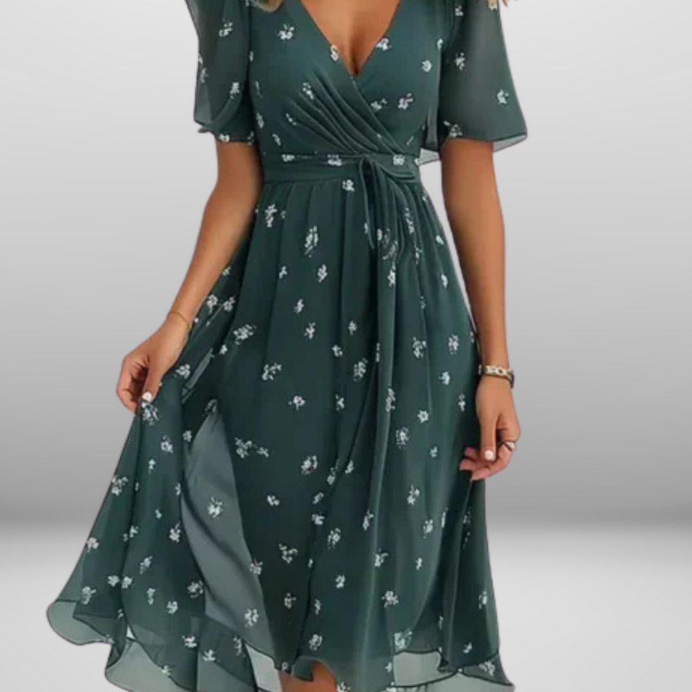 
                  
                    Floranya – Elegante Bloemenjurk met Zwierige Pasvorm
                  
                