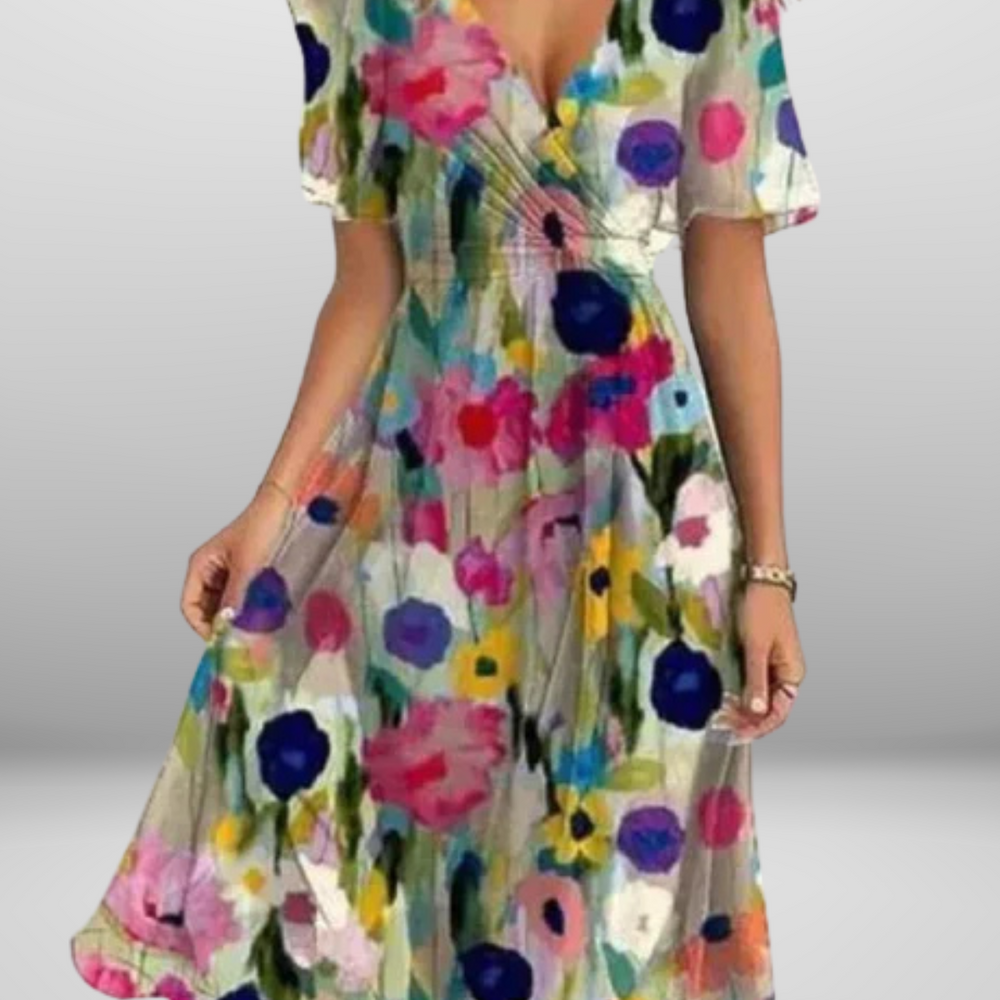 
                  
                    Floranya – Elegante Bloemenjurk met Zwierige Pasvorm
                  
                