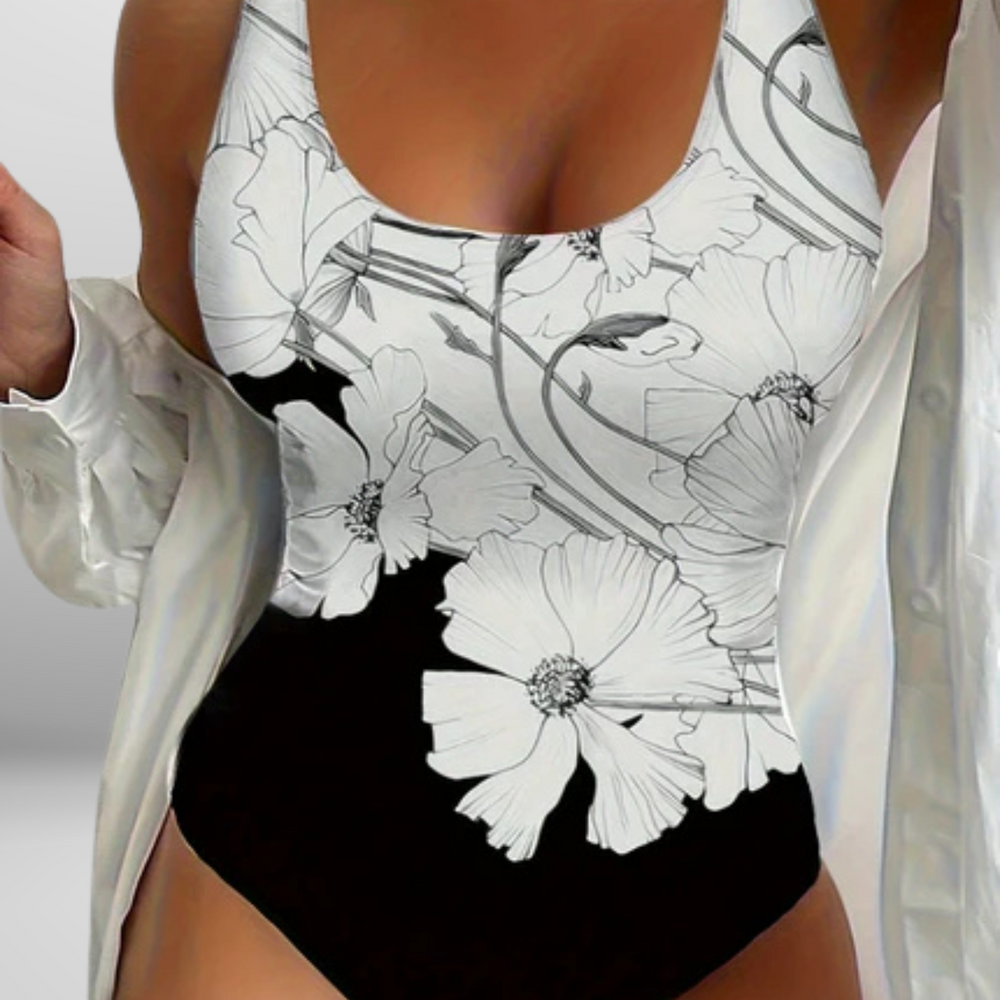 
                  
                    Florencia – Shaping Badpak met Bloemenprint en Flatterend Silhouet
                  
                