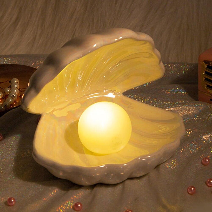 Magische schelpenlamp met parel