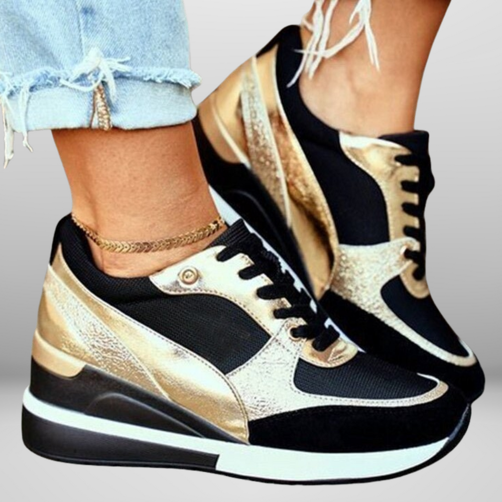 
                  
                    Lumira – Plateau Sneakers met Metallic Details en Sportieve Flair
                  
                