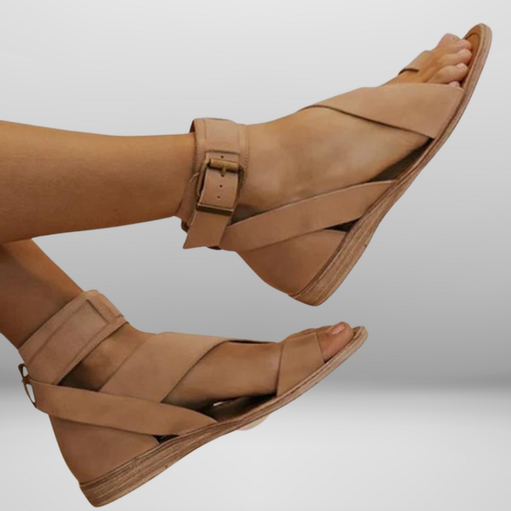
                  
                    Luvessa – Elegante Sandalen met Enkelband en Minimalistisch Kruisdesign
                  
                