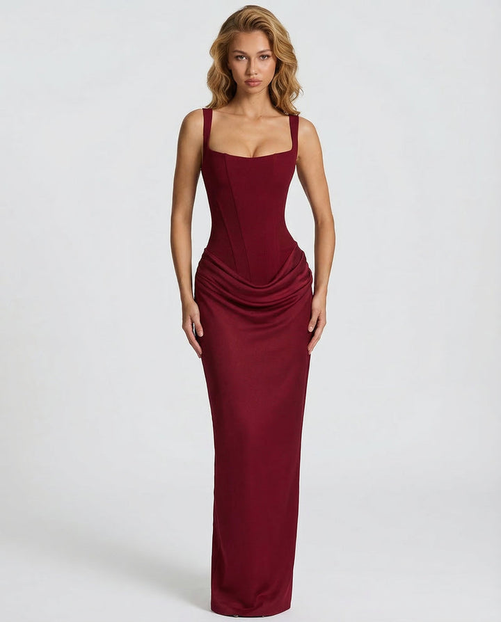 Corset-maxi-jurk met gedrapeerde rok en vetersluiting op de rug.