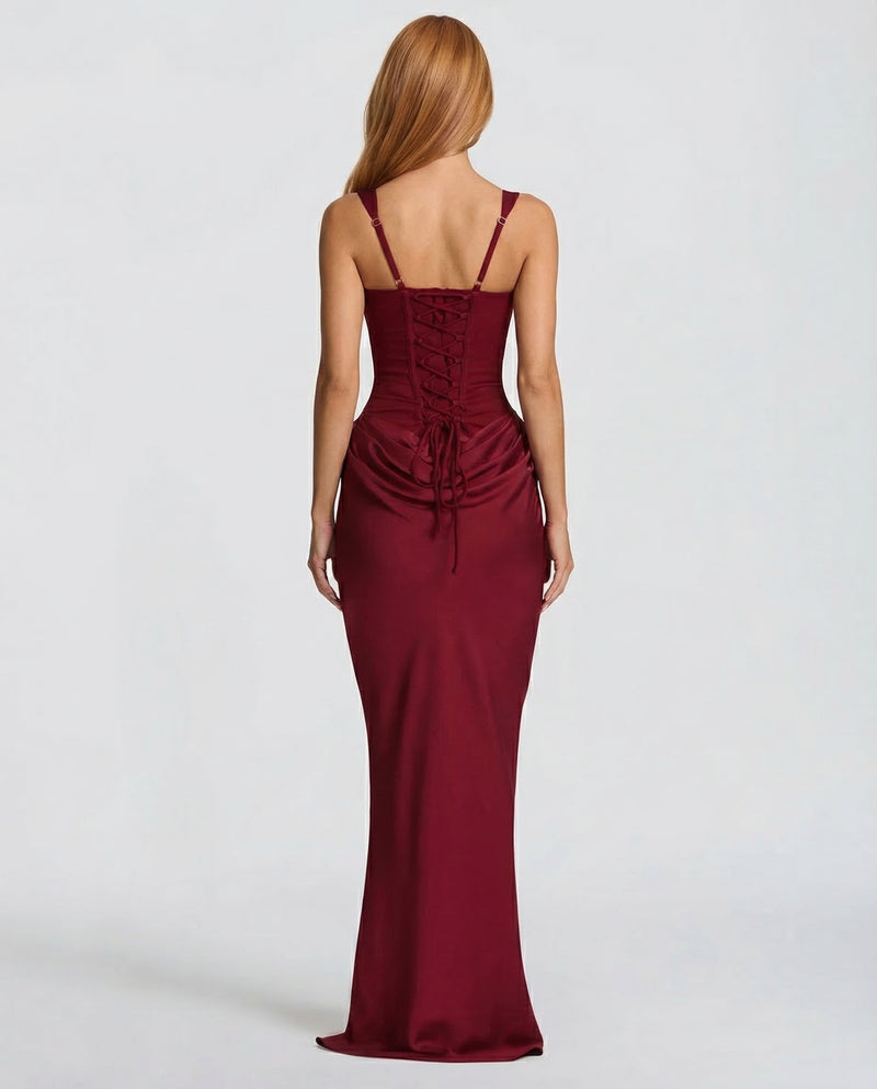 Corset-maxi-jurk met gedrapeerde rok en vetersluiting op de rug.