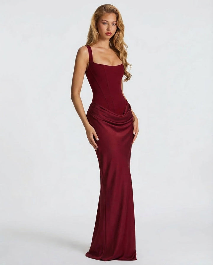 Corset-maxi-jurk met gedrapeerde rok en vetersluiting op de rug.