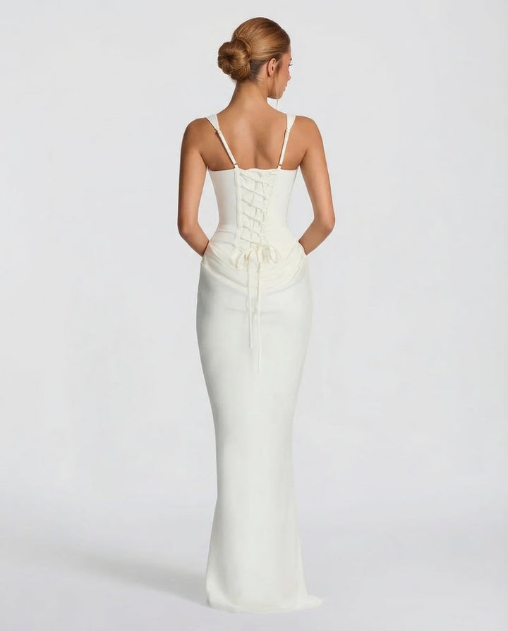 Corset-maxi-jurk met gedrapeerde rok en vetersluiting op de rug.