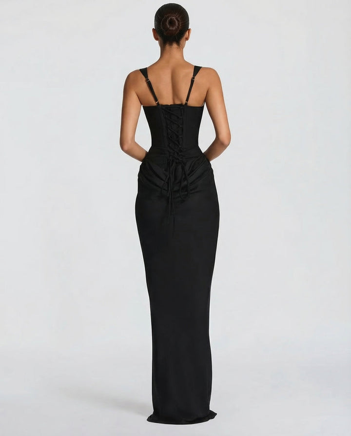 Corset-maxi-jurk met gedrapeerde rok en vetersluiting op de rug.