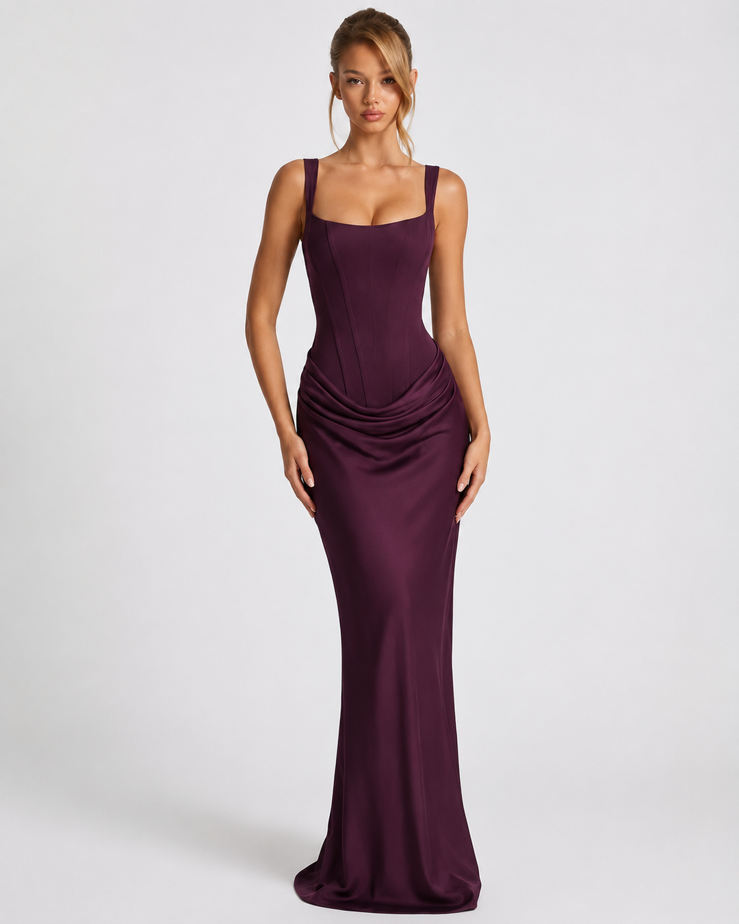 Corset-maxi-jurk met gedrapeerde rok en vetersluiting op de rug.