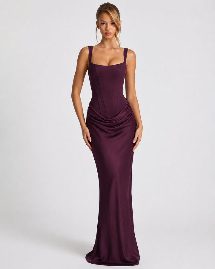 Corset-maxi-jurk met gedrapeerde rok en vetersluiting op de rug.