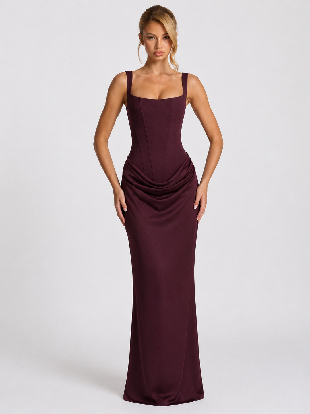 Corset-maxi-jurk met gedrapeerde rok en vetersluiting op de rug.