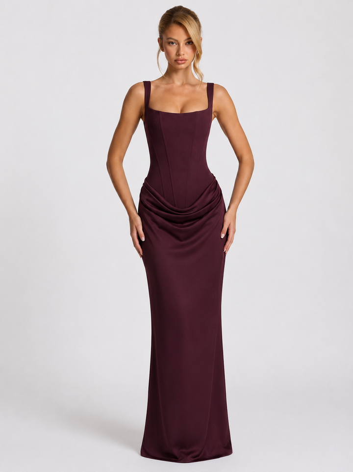 Corset-maxi-jurk met gedrapeerde rok en vetersluiting op de rug.