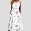 Witte damesjurk met V-hals en bloemenprint – mouwloos