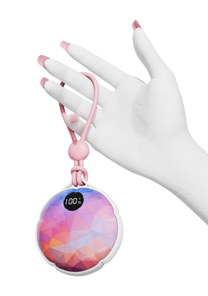 Oplaadbare handwarmer in twee magnetische helften