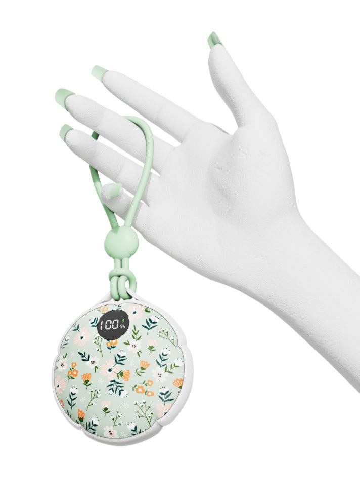 Oplaadbare handwarmer in twee magnetische helften