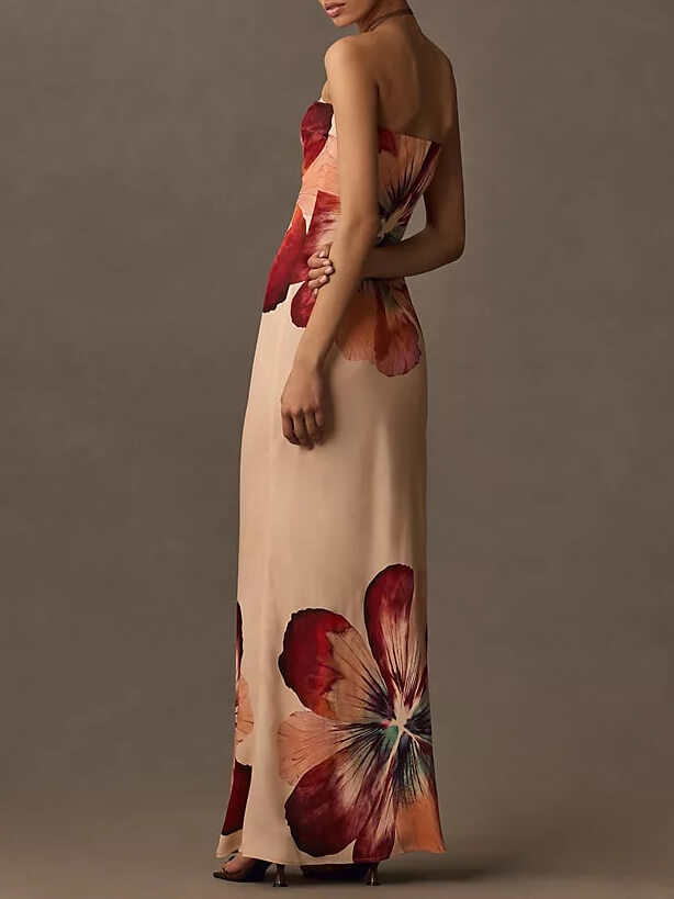 
                  
                    Saphira - Strapless Maxi-Jurk met Grote Bloemenprint - SkinzLine
                  
                