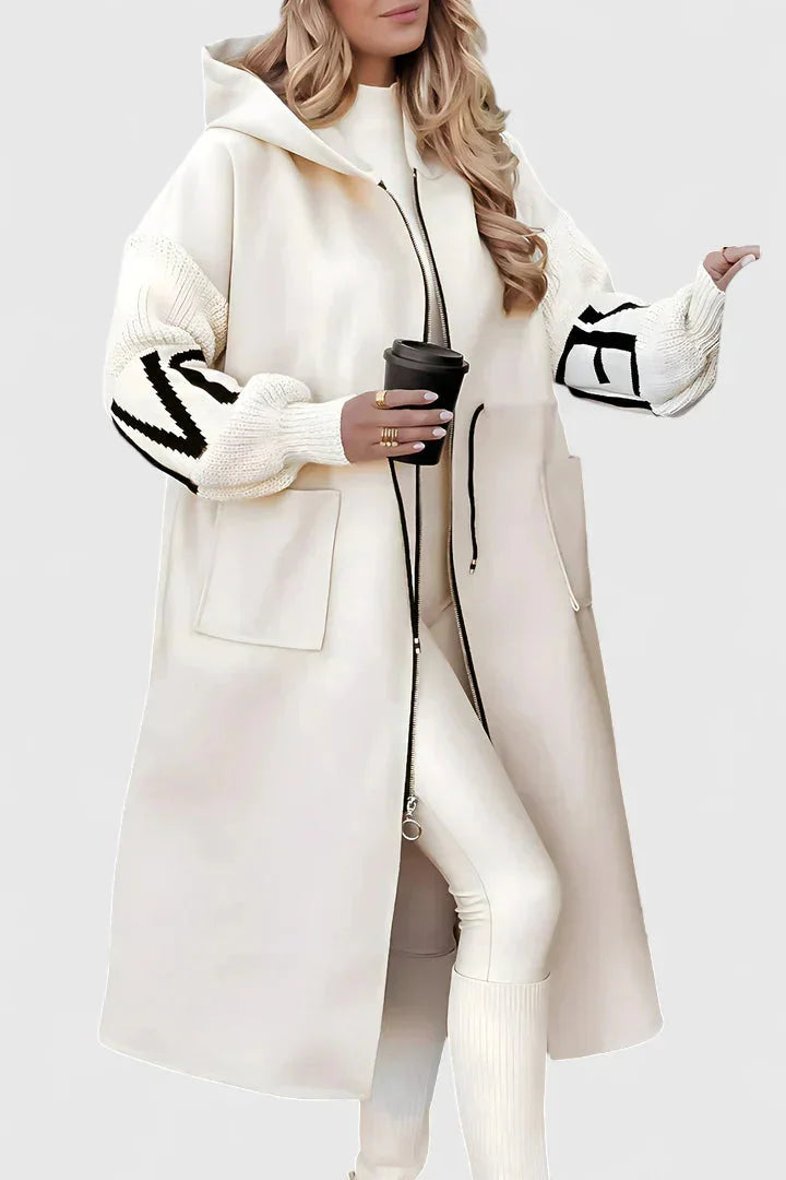 Elegante capuchonjas met flatterende pasvorm