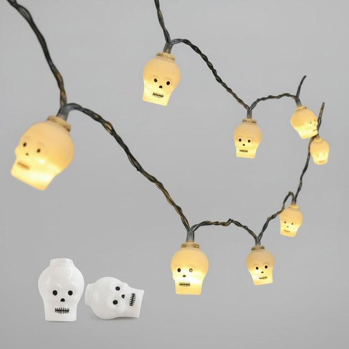 Halloween buitenlichtsnoer op batterijen met LED en griezelige decoratieve kapjes voor terras en feest