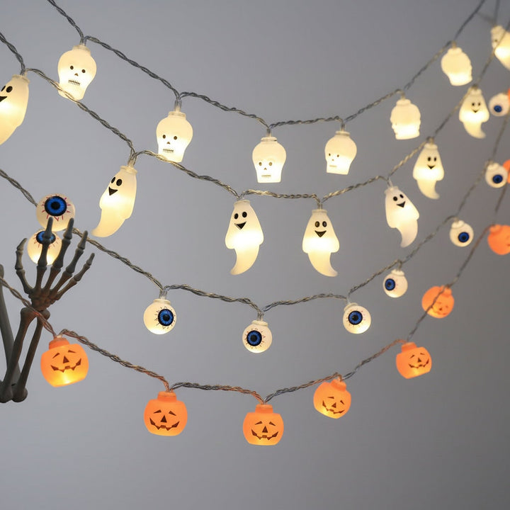 Halloween buitenlichtsnoer op batterijen met LED en griezelige decoratieve kapjes voor terras en feest