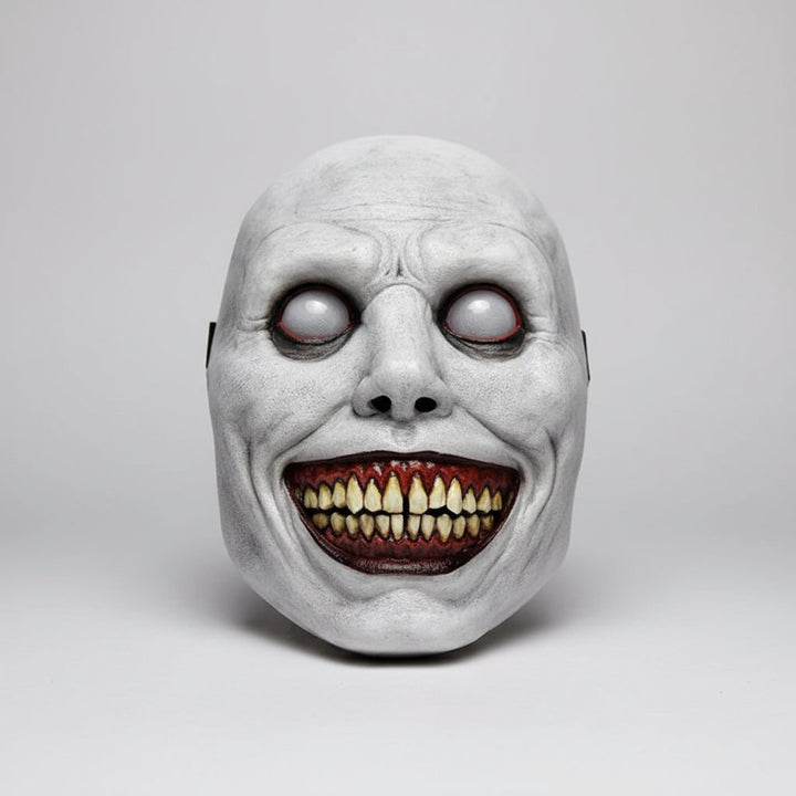 Eng Halloween kostuummasker met creepy demonengezicht met glimlach en gestructureerde gerimpelde huid voor feest