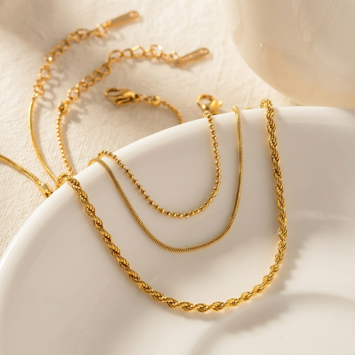 Gouden trio-armbandenset