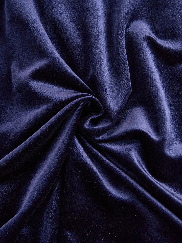 Marineblauwe fluwelen midi-jurk met lange mouwen