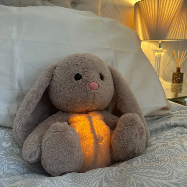Rustgevende ademende knuffel met nachtlampje