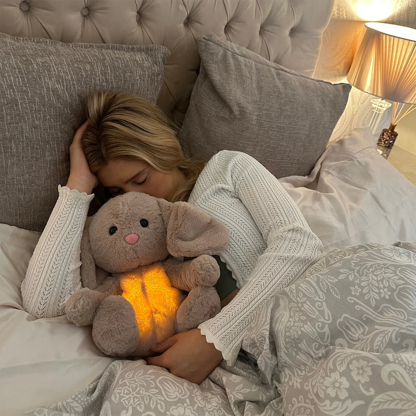 Rustgevende ademende knuffel met nachtlampje