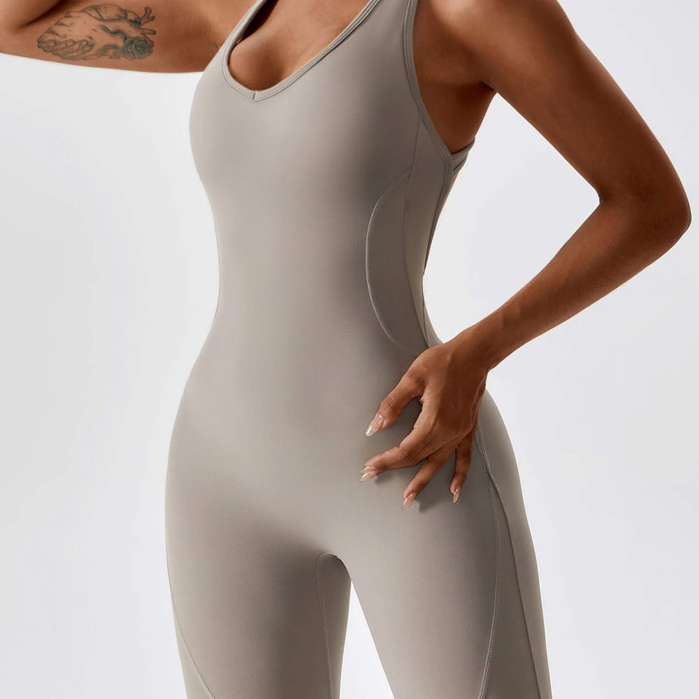
                  
                    SkinzLine open-rug flared sport jumpsuit - SkinzLine
                  
                
