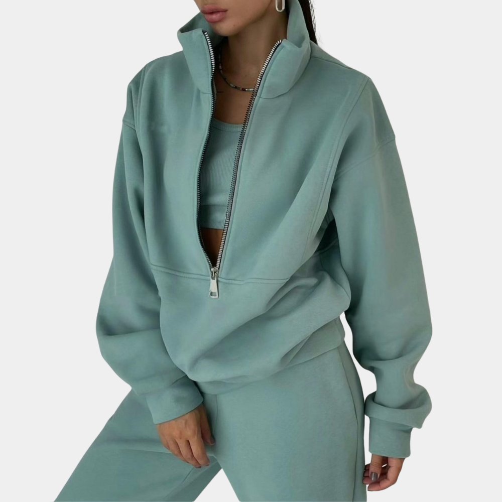 
                  
                    Mirella | Oversized Joggingpak Dames met Rits en Hoge Kraag | Trendy Trainingspak - SkinzLine
                  
                