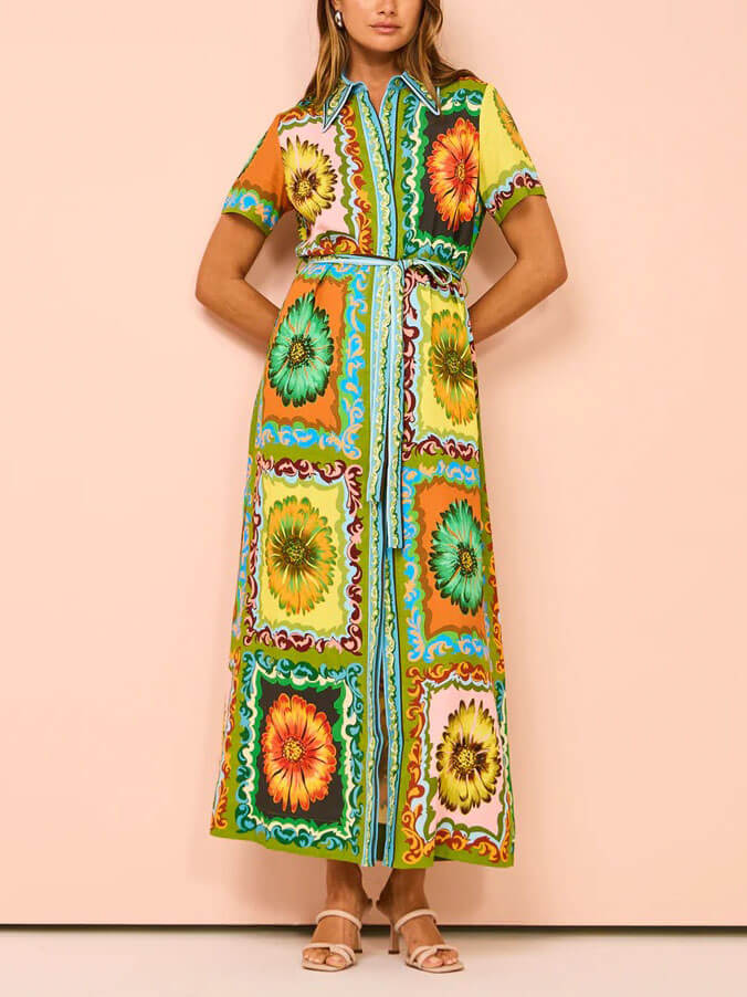 
                  
                    Vintara - Maxi-overhemdjurk met Zomerse Print - SkinzLine
                  
                