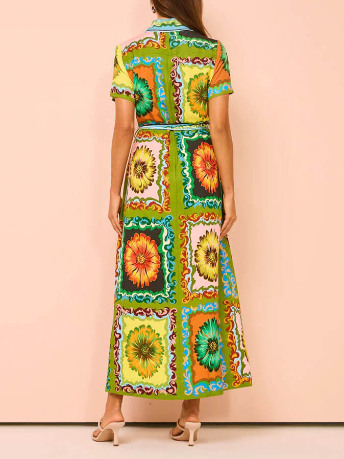 
                  
                    Vintara - Maxi-overhemdjurk met Zomerse Print - SkinzLine
                  
                