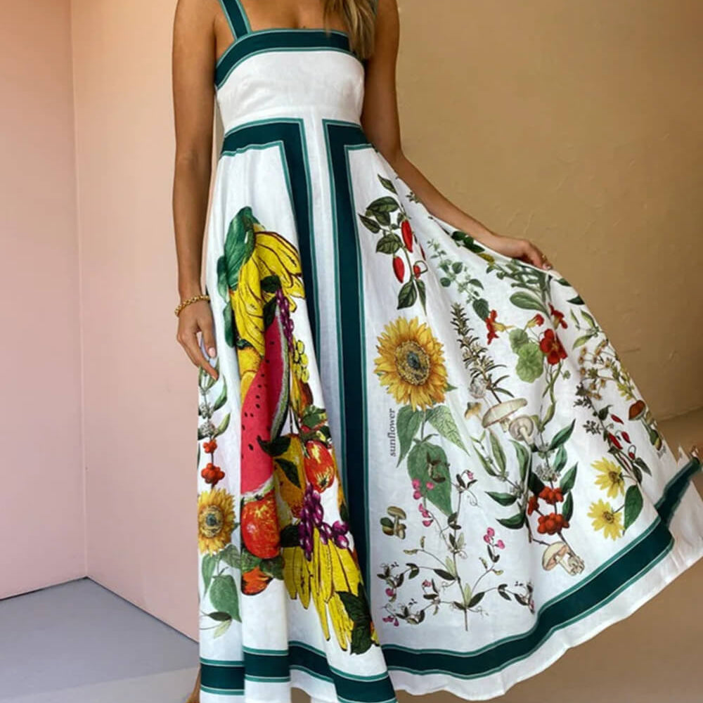 
                  
                    Flora - Maxi-jurk met Botanische Print - SkinzLine
                  
                