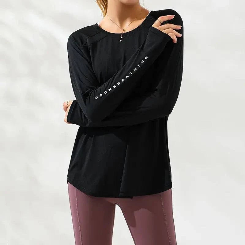 
                  
                    Fitness sporttop lange mouwen - losse pasvorm, plus-size - SkinzLine
                  
                