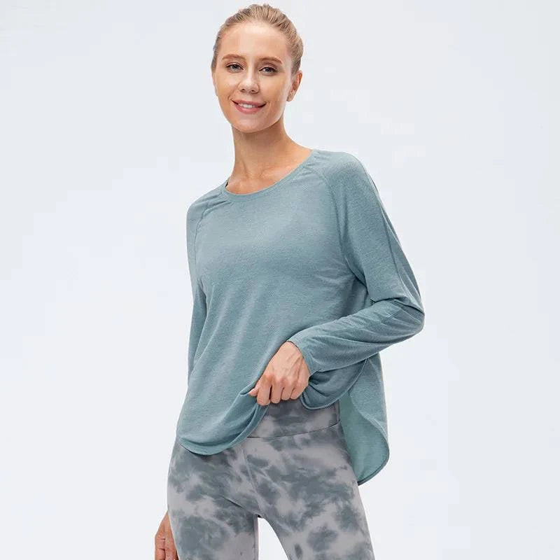 
                  
                    Naadloze Sporttop met Lange Mouwen – Plus-Size - SkinzLine
                  
                
