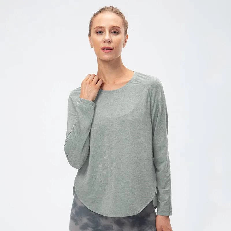 
                  
                    Naadloze Sporttop met Lange Mouwen – Plus-Size - SkinzLine
                  
                